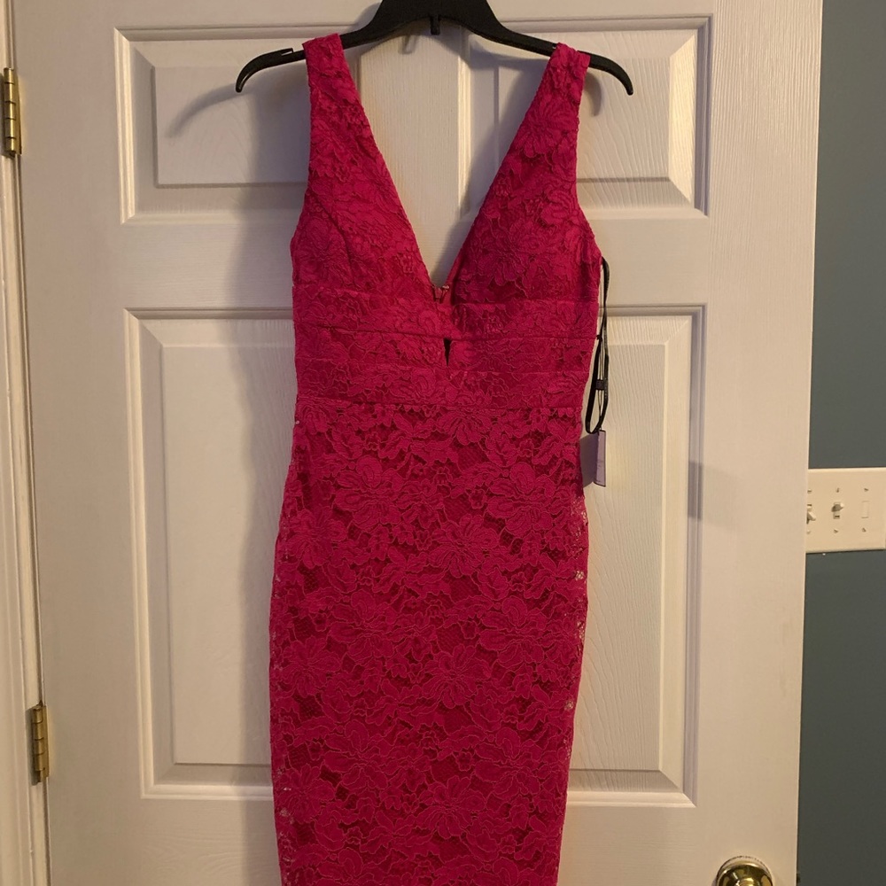 Pink dress comes below knee
